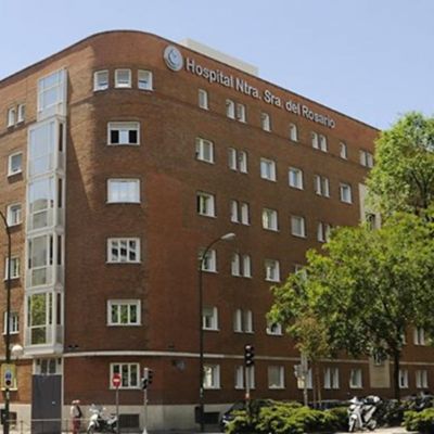 Tell viewers as much as possible about the image, using as few words as possible. Remove unnecessary words like 'the' and 'and'. Example: 'doctor wearing lab coat looking at screen' or 'guy shaving face in mirror'